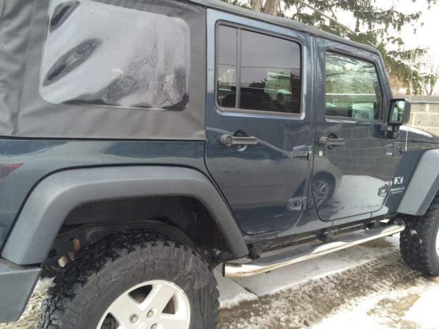 Steel Blue Gray 4 Door Soft Top Oversize Wheels Stick