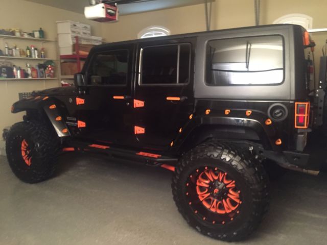 Custom black Jeep with Orange highlights; 
